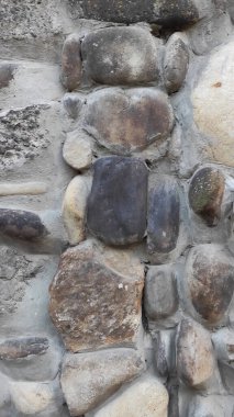 Taş dokusu. Dikey 16x9. Doğal taşın fotoğrafı. Doğal taş.