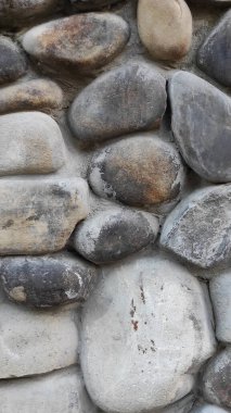 Taş dokusu. Dikey 16x9. Doğal taşın fotoğrafı. Doğal taş.