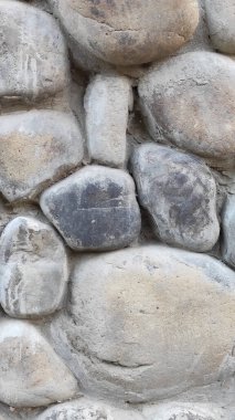 Taş dokusu. Dikey 16x9. Doğal taşın fotoğrafı. Doğal taş.