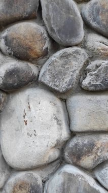 Taş dokusu. Dikey 16x9. Doğal taşın fotoğrafı. Doğal taş.