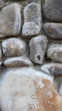 Taş dokusu. Dikey 16x9. Doğal taşın fotoğrafı. Doğal taş.