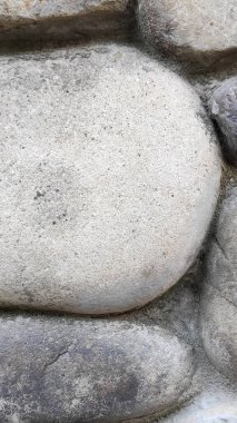 Taş dokusu. Dikey 16x9. Doğal taşın fotoğrafı. Doğal taş.