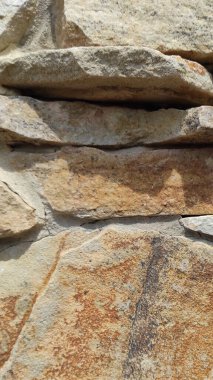 Taş dokusu. Dikey 16x9. Doğal taşın fotoğrafı. Doğal taş.