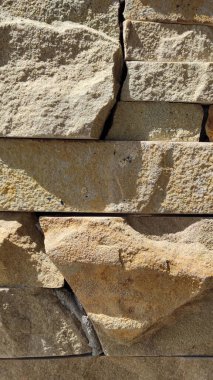 Taş dokusu. Dikey 16x9. Doğal taşın fotoğrafı. Doğal taş.