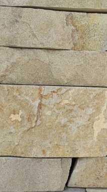 Taş dokusu. Dikey 16x9. Doğal taşın fotoğrafı. Doğal taş.