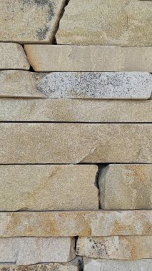 Taş dokusu. Dikey 16x9. Doğal taşın fotoğrafı. Doğal taş.