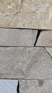 Taş dokusu. Dikey 16x9. Doğal taşın fotoğrafı. Doğal taş.