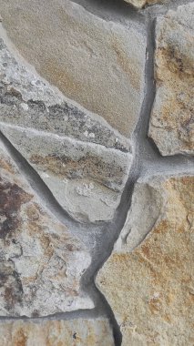 Taş dokusu. Dikey 16x9. Doğal taşın fotoğrafı. Doğal taş.