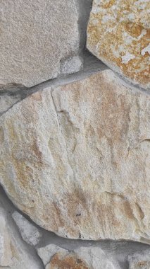 Taş dokusu. Dikey 16x9. Doğal taşın fotoğrafı. Doğal taş.