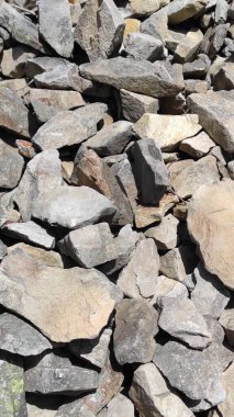 Taş dokusu. Dikey 16x9. Doğal taşın fotoğrafı. Doğal taş.