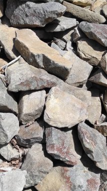 Taş dokusu. Dikey 16x9. Doğal taşın fotoğrafı. Doğal taş.