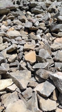 Taş dokusu. Dikey 16x9. Doğal taşın fotoğrafı. Doğal taş.