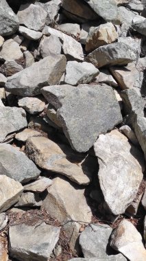 Taş dokusu. Dikey 16x9. Doğal taşın fotoğrafı. Doğal taş.