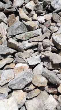 Taş dokusu. Dikey 16x9. Doğal taşın fotoğrafı. Doğal taş.