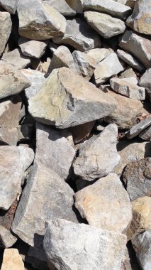 Taş dokusu. Dikey 16x9. Doğal taşın fotoğrafı. Doğal taş.