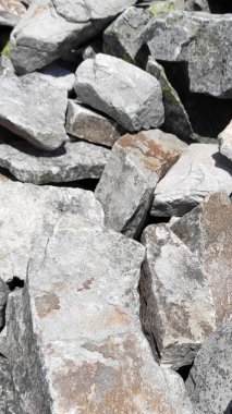 Taş dokusu. Dikey 16x9. Doğal taşın fotoğrafı. Doğal taş.