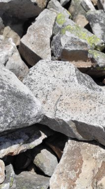 Taş dokusu. Dikey 16x9. Doğal taşın fotoğrafı. Doğal taş.