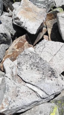 Taş dokusu. Dikey 16x9. Doğal taşın fotoğrafı. Doğal taş.