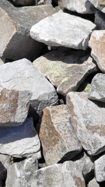 Taş dokusu. Dikey 16x9. Doğal taşın fotoğrafı. Doğal taş.