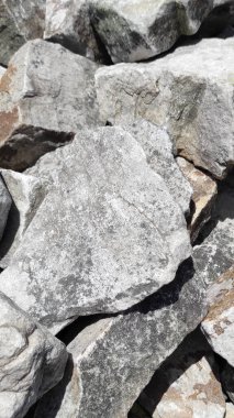 Taş dokusu. Dikey 16x9. Doğal taşın fotoğrafı. Doğal taş.