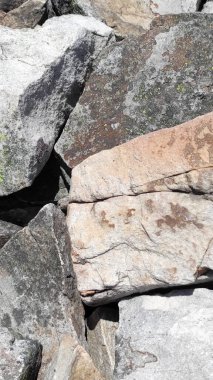 Taş dokusu. Dikey 16x9. Doğal taşın fotoğrafı. Doğal taş.