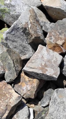 Taş dokusu. Dikey 16x9. Doğal taşın fotoğrafı. Doğal taş.