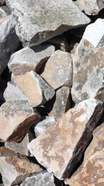 Taş dokusu. Dikey 16x9. Doğal taşın fotoğrafı. Doğal taş.