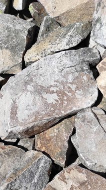 Taş dokusu. Dikey 16x9. Doğal taşın fotoğrafı. Doğal taş.