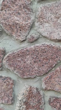 Taş dokusu. Dikey 16x9. Doğal taşın fotoğrafı. Doğal taş.