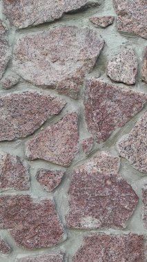 Taş dokusu. Dikey 16x9. Doğal taşın fotoğrafı. Doğal taş.