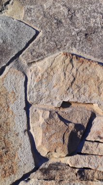 Taş dokusu. Dikey 16x9. Doğal taşın fotoğrafı. Doğal taş.