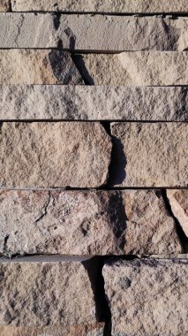 Taş dokusu. Dikey 16x9. Doğal taşın fotoğrafı. Doğal taş.