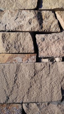 Taş dokusu. Dikey 16x9. Doğal taşın fotoğrafı. Doğal taş.