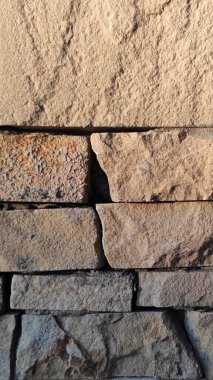 Taş dokusu. Dikey 16x9. Doğal taşın fotoğrafı. Doğal taş.