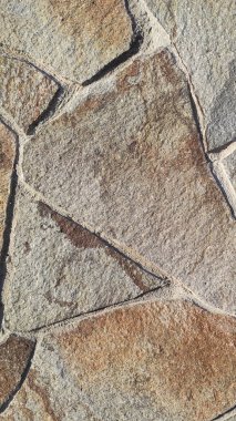 Taş dokusu. Dikey 16x9. Doğal taşın fotoğrafı. Doğal taş.