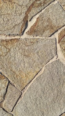 Taş dokusu. Dikey 16x9. Doğal taşın fotoğrafı. Doğal taş.