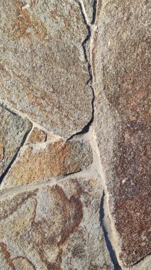 Taş dokusu. Dikey 16x9. Doğal taşın fotoğrafı. Doğal taş.