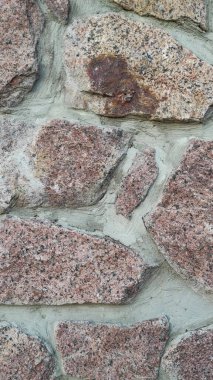 Taş dokusu. Dikey 16x9. Doğal taşın fotoğrafı. Doğal taş.