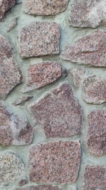 Taş dokusu. Dikey 16x9. Doğal taşın fotoğrafı. Doğal taş.