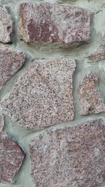 Taş dokusu. Dikey 16x9. Doğal taşın fotoğrafı. Doğal taş.