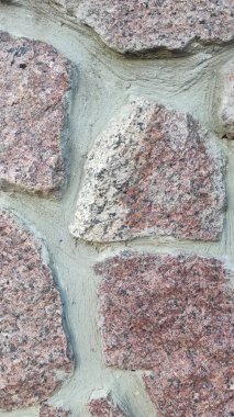 Taş dokusu. Dikey 16x9. Doğal taşın fotoğrafı. Doğal taş.