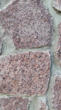 Taş dokusu. Dikey 16x9. Doğal taşın fotoğrafı. Doğal taş.