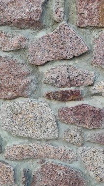 Taş dokusu. Dikey 16x9. Doğal taşın fotoğrafı. Doğal taş.