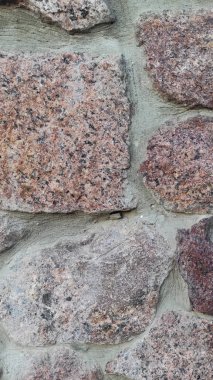 Taş dokusu. Dikey 16x9. Doğal taşın fotoğrafı. Doğal taş.