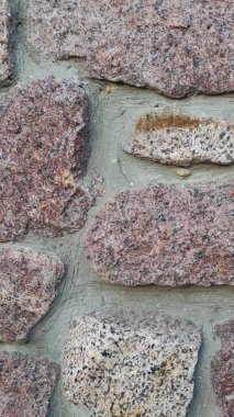 Taş dokusu. Dikey 16x9. Doğal taşın fotoğrafı. Doğal taş.