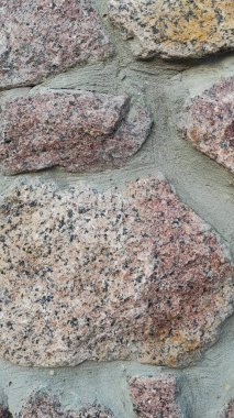 Taş dokusu. Dikey 16x9. Doğal taşın fotoğrafı. Doğal taş.