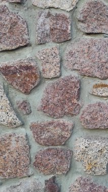 Taş dokusu. Dikey 16x9. Doğal taşın fotoğrafı. Doğal taş.