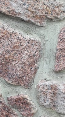 Taş dokusu. Dikey 16x9. Doğal taşın fotoğrafı. Doğal taş.