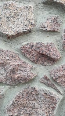 Taş dokusu. Dikey 16x9. Doğal taşın fotoğrafı. Doğal taş.