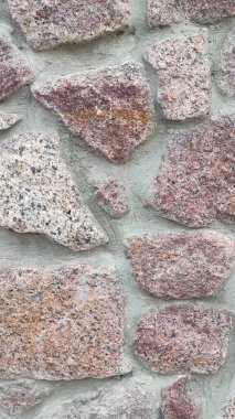 Taş dokusu. Dikey 16x9. Doğal taşın fotoğrafı. Doğal taş.